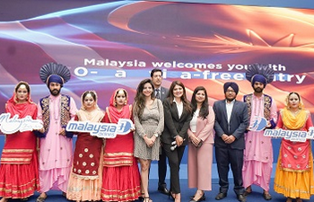 Tourism Malaysia & Malaysia Airlines officials with cultural dancers at Amritsar