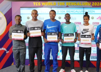 TCS World 10K Bengaluru 2024 International Elite Athletes (L to R), Emmaculate Achol (Kenya), Peter Mwaniki (Kenya), Bravin Kiptoo            (Kenya), Bravin Kiprop (Kenya), Lemlem Hailu (Ethiopia) and Lilian Kasait (Kenya) at the TCS World 10K Media Center.