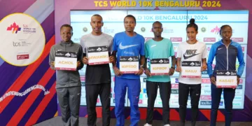 TCS World 10K Bengaluru 2024 International Elite Athletes (L to R), Emmaculate Achol (Kenya), Peter Mwaniki (Kenya), Bravin Kiptoo            (Kenya), Bravin Kiprop (Kenya), Lemlem Hailu (Ethiopia) and Lilian Kasait (Kenya) at the TCS World 10K Media Center.